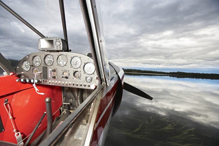 USA, Alaska, cockpit of sea plane on lake, close up